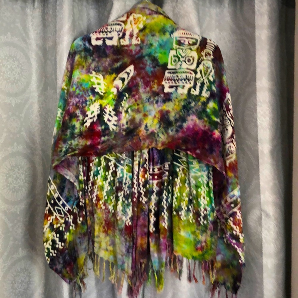 Multi colored, tribal print scarf/sarong. Very versatile and pretty. One size